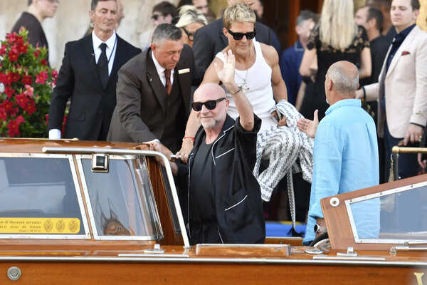 Domenico Dolce leaves a hotel during celebrations for Jeff Bezos and Lauren Sanchez Bezos' wedding, in Venice, Saturday, June 28, 2025. (AP Photo/Luigi Costantini) Italy Venice Bezos Wedding