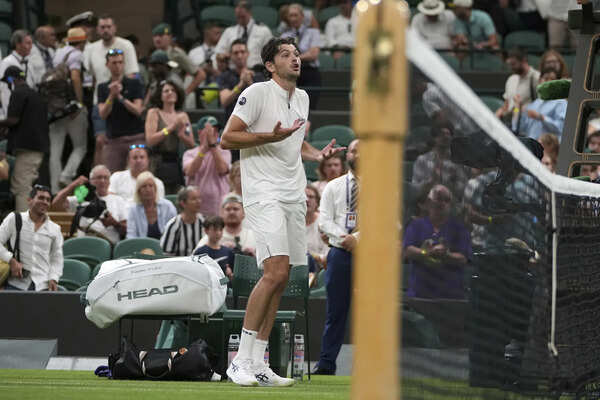 Taylor Fritz's match against Geoani Mapeti Pericard was suspended due to curfew in Wimbledon in London. (AP) Wimbledon: Giovanni MPETshi Perricard Hit Tournament-Criminal is against 153 mph service Taylor Fritz