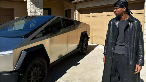Shai Gilgeous Alexander with his Tesla Cybertrack