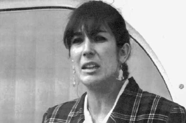 FILE - Ghislaine Maxwell, daughter of late British publisher Robert Maxwell, reads a statement expressing her family's gratitude to Spanish authorities after recovery of his body, Nov. 7, 1991, in Tenerife, Spain. (AP Photo/Dominique Mollard, File) Ghislaine Maxwell