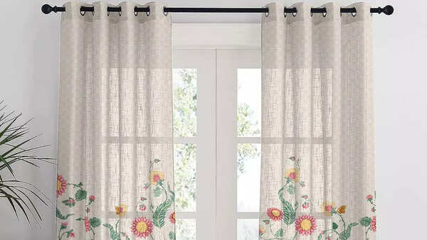 Replace heavy curtains with sheer, airy drapes