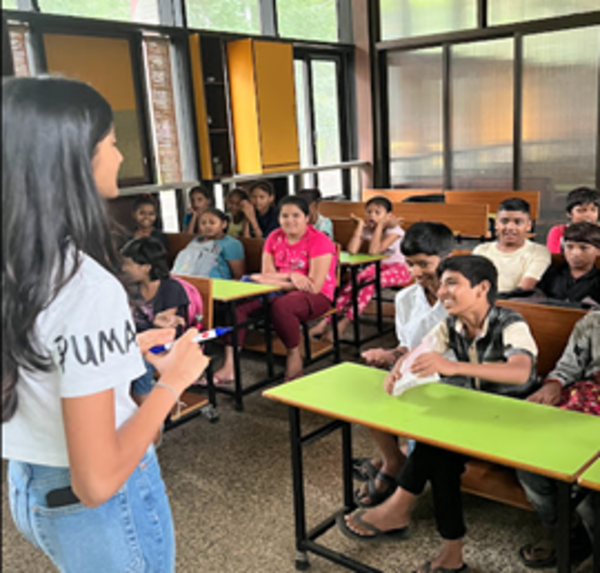 SMILE Volunteers conducting classes for students