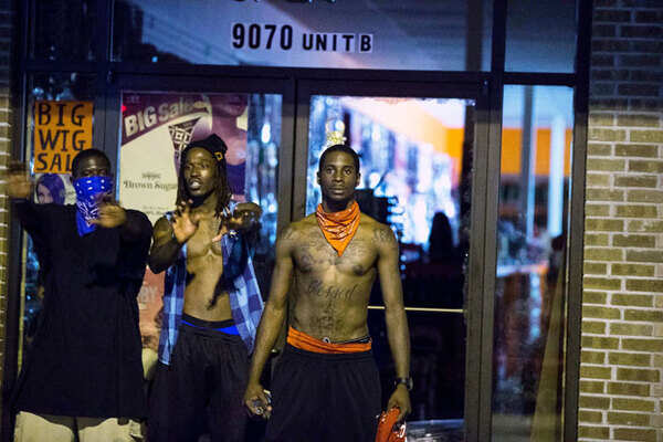 Ferguson riots show US racial tensions in black and white - Times of India