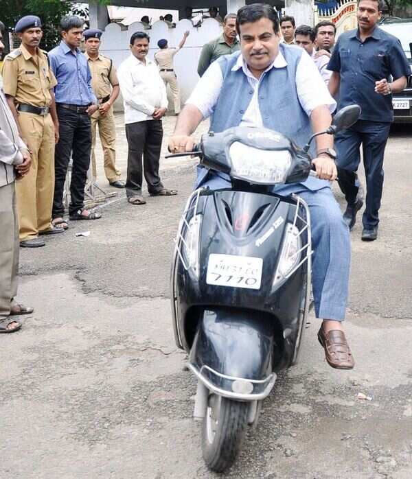 Nitin Gadkari, Union transport and highways minister, rides scooter without helmet India News