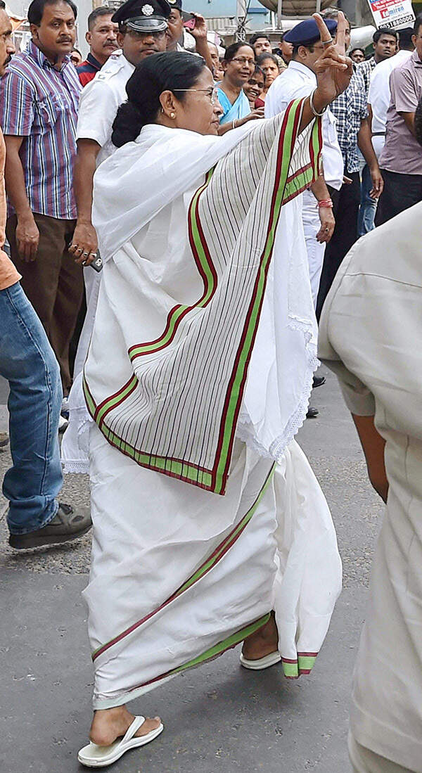 Mamata Banerjee swaggers away PTI