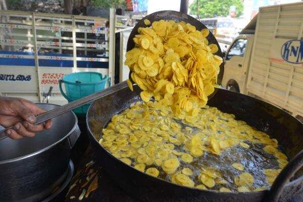 Traditional Indian banana chips preparation