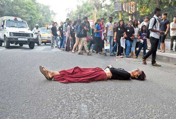Vikram Aditya Sahai, an Ambedkar University professor, lay down on the road to protest against the march, which then just walked around him (BCCL)