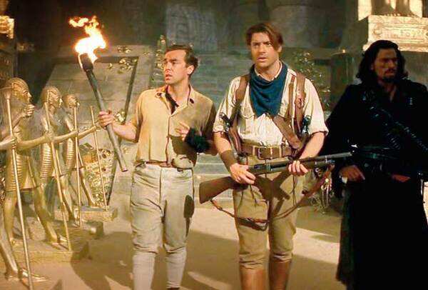 'The Mummy': In this 1999 movie, Brendan Fraser plays an adventurer who fights off an evil mummy. He also happens to chance upon a massive treasure hidden in a chamber while trying to escape from killer beetles!