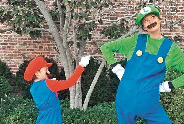 Gisele Bundchen as Luigi and her son as Mario