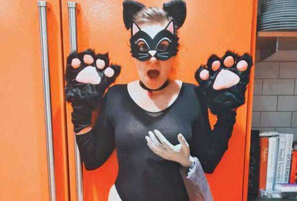 Hillary Clinton-supporter Lena Dunham took a dig at Donald Trump's infamous 'grab them by the p***y' comment by dressing up as a pussy(cat) being grabbed