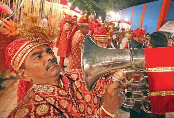 Despondent bandwallahs (above) and dholwallahs (below) pose for DT (BCCL)