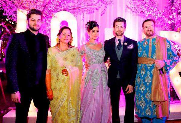 Neil's family ' brother Naman Nitin Mukesh, mom Nishi and dad Nitin Mukesh