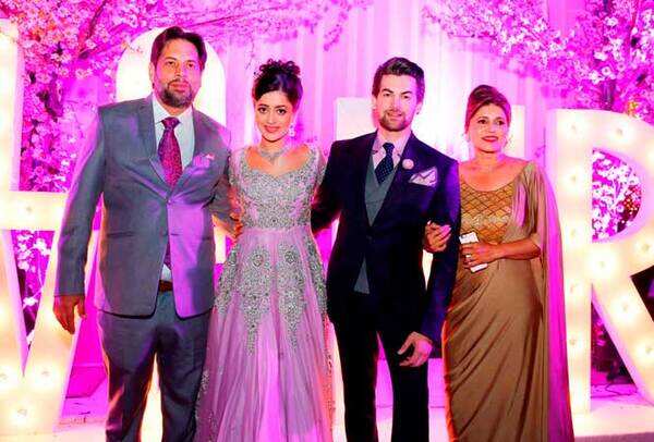 Neil and Rukmini with Rukmini's parents, Rustom Kerawalla and Kavita Sahay