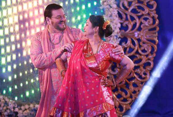 Nitin Mukesh and Nishi Mukesh, Neil's mom and dad, shaking a leg at their son's sangeet ceremony