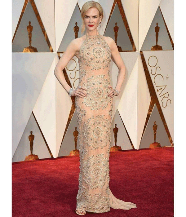 nicole kidman cut out dress Nicole Kidman wears a black dress with a huge cut-out in London
