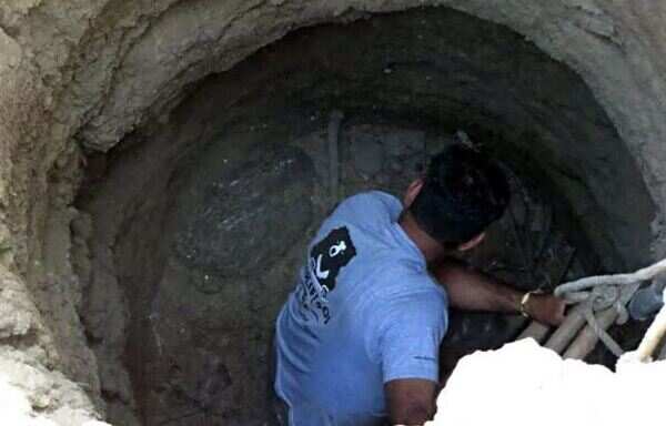 Python Rescued: Python trapped inside 40 foot deep uncovered well ...