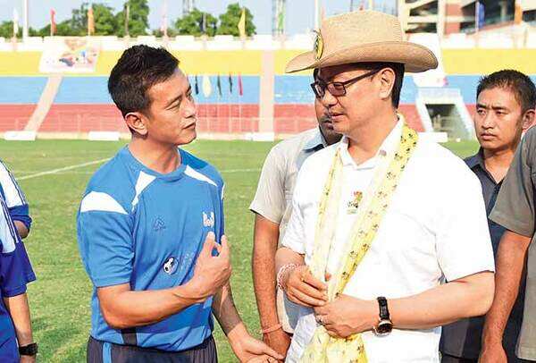 SOME CHARCHA: Bhaichung Bhutia briefing Kiren Rijijub about the match (BCCL)