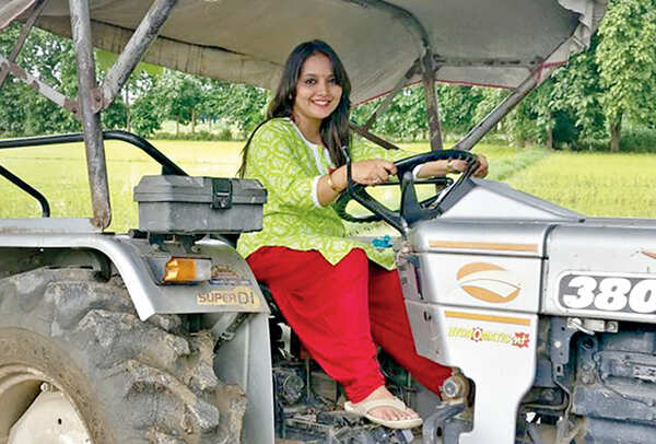 Nidhi driving a tractor in her village (BCCL)
