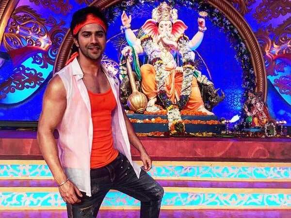Varun Dhawan poses with Lord Ganesha in Raja's avatar from 'Judwaa 2'.