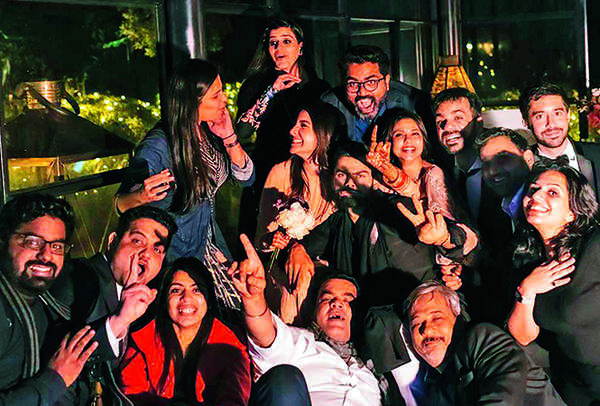 Devika (bottom row in red coat) partying with Virat and Anushka post the wedding in Tuscany while Joseph clicked the photo (BCCL)