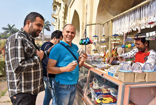 The musicians buying trinket from Bara Imambara (BCCL/ Vishnu Jaiswal)