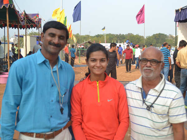 Sayali with coach and mentor
