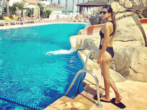 Nia Sharma Sexy Pool Photos