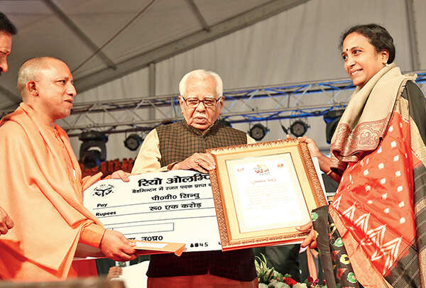 PV Sindhu’s mother, P Vijaya received the award from the UP CM and Governor in Lucknow on Friday (BCCL/ Aditya Yadav)