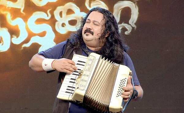 Manoj Bangalore playing accordion