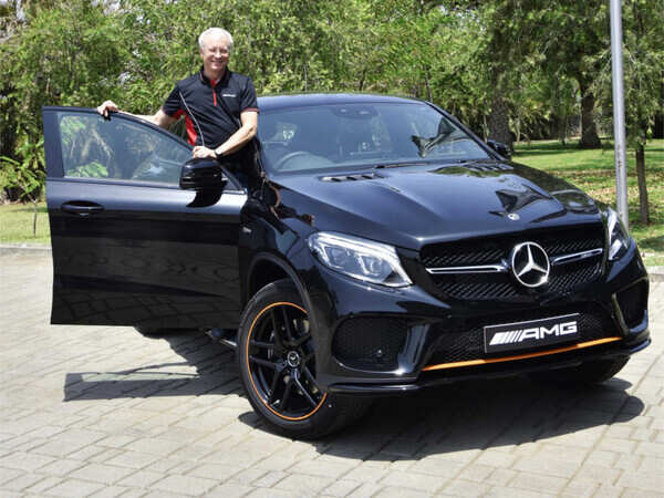 Mr. Roland Folger, MD & CEO, Mercedes-Benz India with the limited edition Mercedes-AMG GLE 43 4MATIC Coupe ‘OrangeArt’