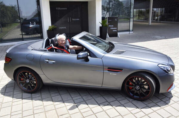 Mr. Roland Folger, MD & CEO, Mercedes-Benz India with the limited edition Mercedes-AMG SLC 43 ‘RedArt’ Editions