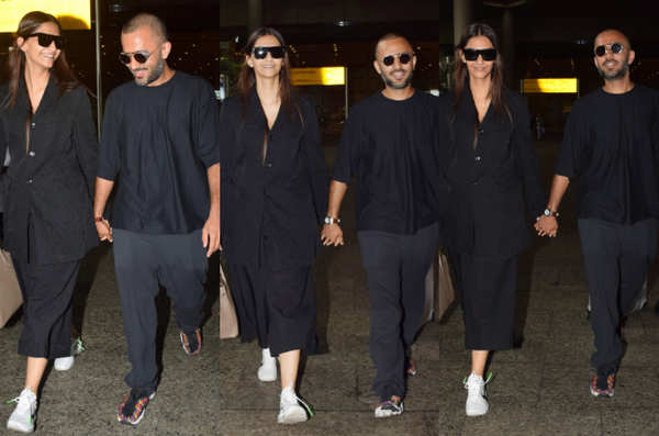 Newlyweds Sonam Kapoor and Anand Ahuja twin at the airport and