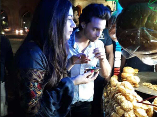 Warina and Aayush enjoy the local street food