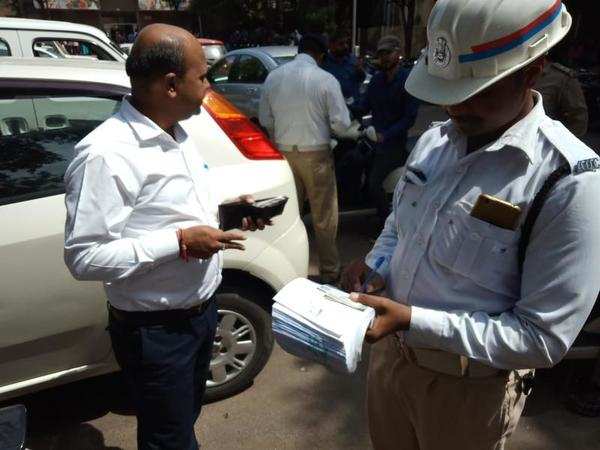 971 govt employees fined Rs 1 lakh in 2 hours | Ahmedabad News - Times ...