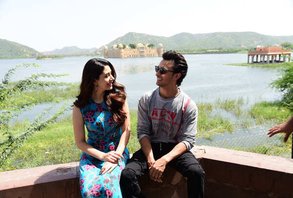 SOAKING IN THE JAIPUR SUN: Aayush and Warina in front of the Jal Mahal
