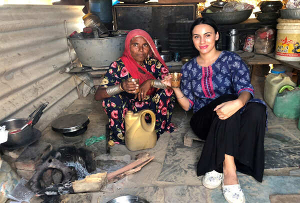 Deana enjoying her cup of tea with a banjaran woman