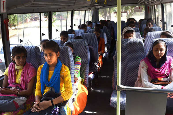 To get girls to college, this couple bought a bus with their PF money |  India News - Times of India