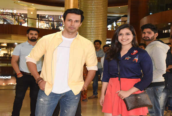 Actors Rajniesh Duggall and Mannara Chopra posing for shutterbugs
