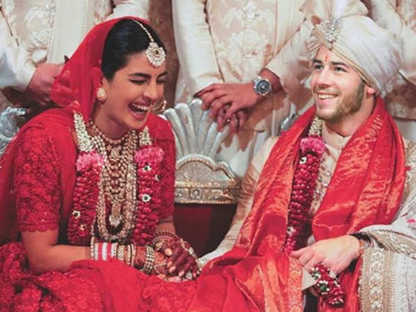 This Bride's Red-On-Red Fairy Tale Outfit Is Reminding Us Of Priyanka  Chopra's Wedding Finery | Red wedding lehenga, Bridal lehenga red, Wedding  lehenga designs