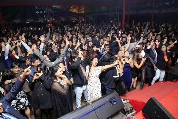 Revellers cheer as the clock struck 12
