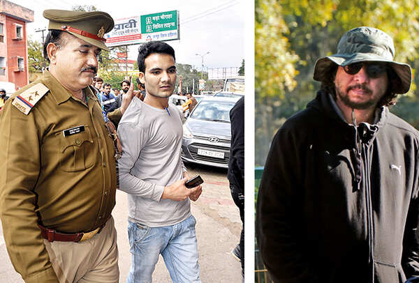 A cop taking away a fan of Nawazuddin Siddiqui who tried to click a selfie with the actor and (R) director Honey Trehan (BCCL/ AS Rathor)