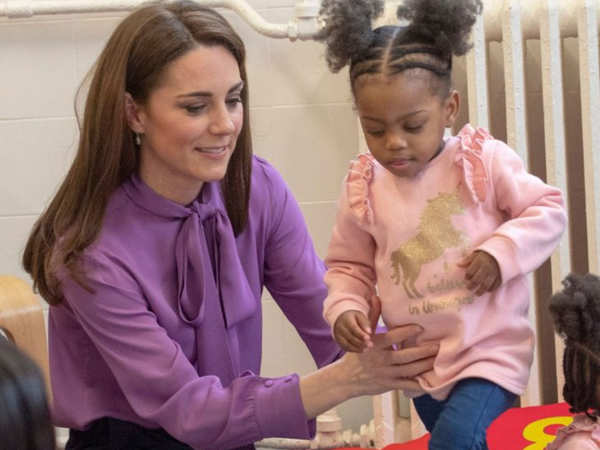 Is Kate Middleton Wearing Her Purple Gucci Blouse Backward