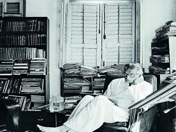 Immersed in work at his study