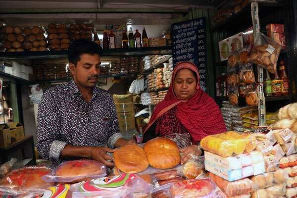 Saiqua Syyed and brother running the Old Mohammadi bakery that sells traditional eid breads since pre-independence era
