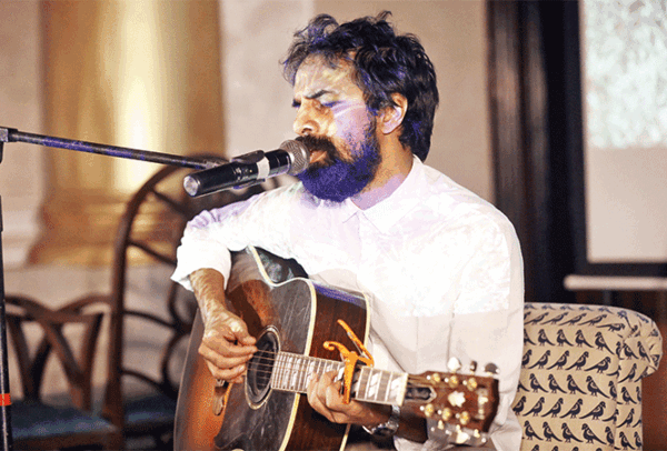 LKDT1225-Music-composer-Ankur-Tewari-performs-a-song-on-air-pollution