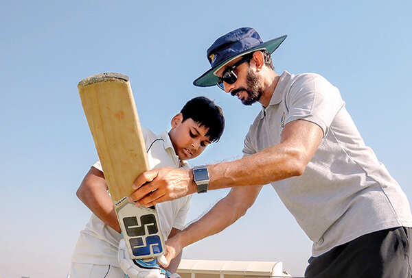 Cricketer Vikram Rathour training a young player at a sports camp (BCCL/ Vishnu Jaiswal)
