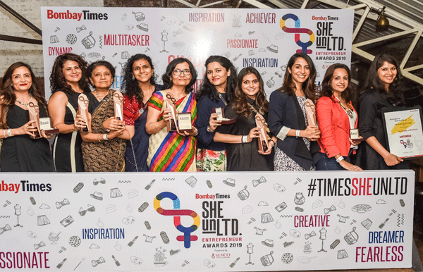 Winners of the food category pose for the cameras