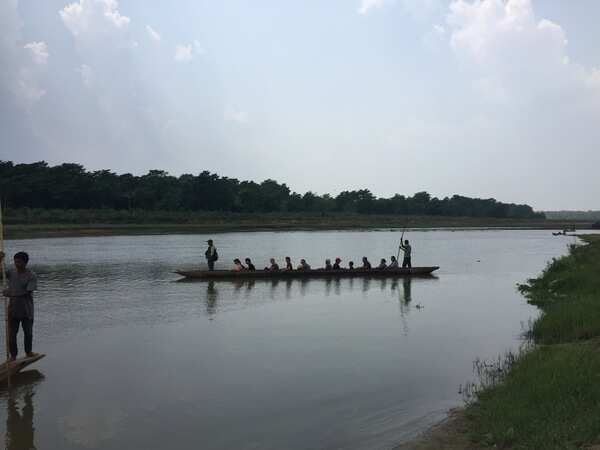 Learning the art of rowing the boat at Kerala.