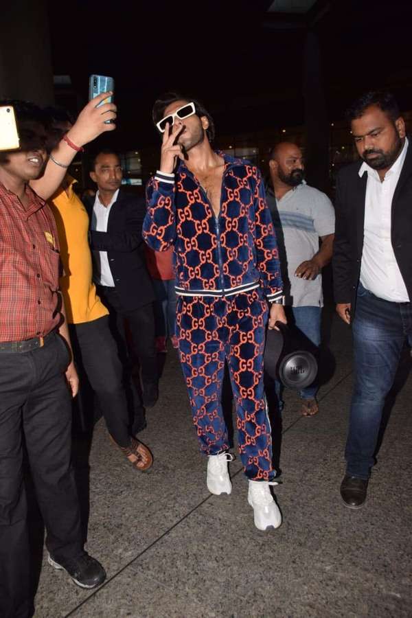 Photos: Ranveer Singh sports a funky tracksuit at the airport | Hindi ...