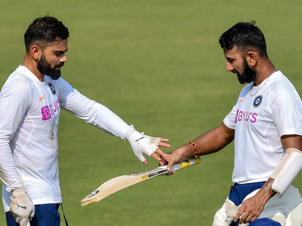 Kohli-Pujara-afp